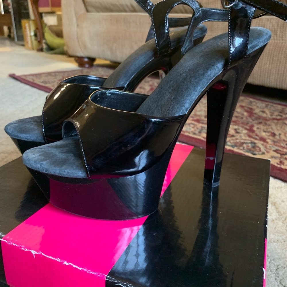 Ellie black patent platform shoes.